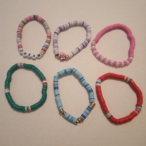 #673.  6 Piece Assorted Colorful Stretch Bracelet Bundle